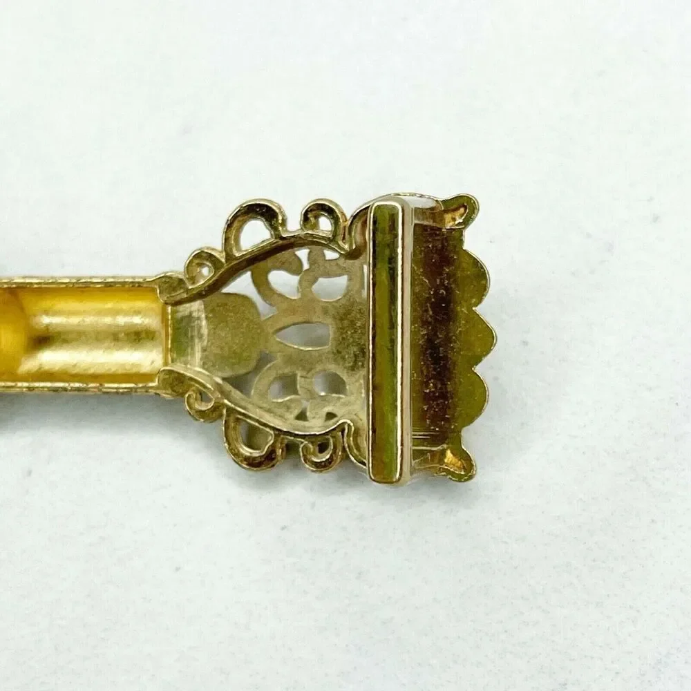 Small Ornate Bow Gold Tone Belt Buckle